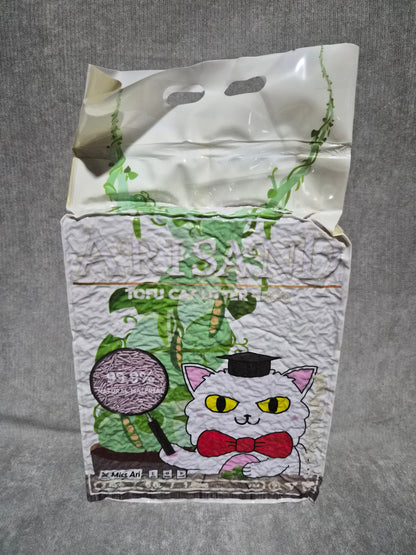 Cartoon cat design on a plastic bag with a gray background